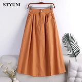 Huibaolu Cotton Elastic Waist A-line Solid Casual Loose Women's Skirt Korean Fashion Mid-Calf Long Skirts For Women 2023 Summer