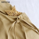 Huibaolu Lace up Elastic High Waist Solid Casual A-line Women's Skirt Korean Fashion Mid-Calf Skirts For Women 2023 Summer